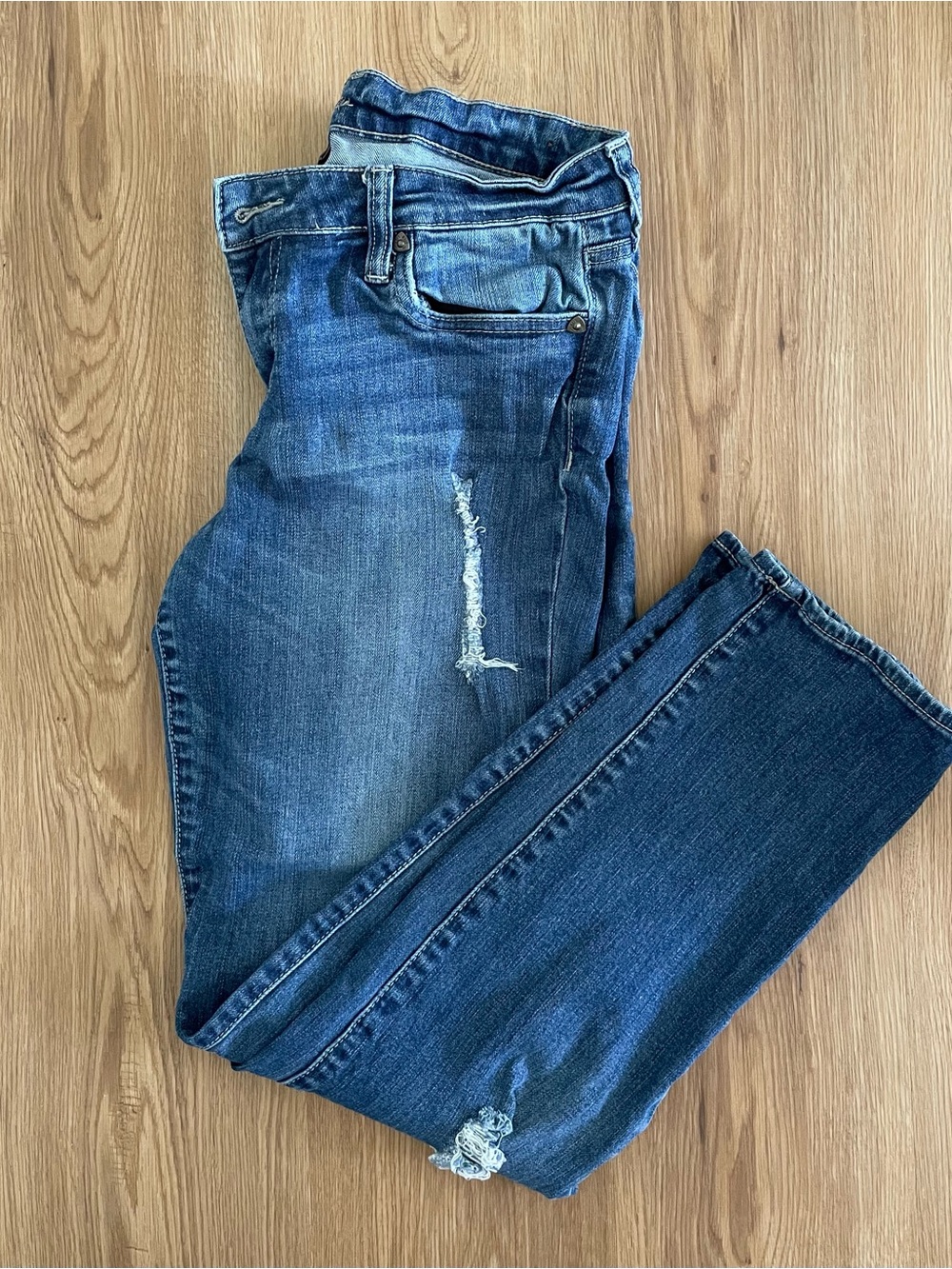 Distressed Blue Denim Jeans